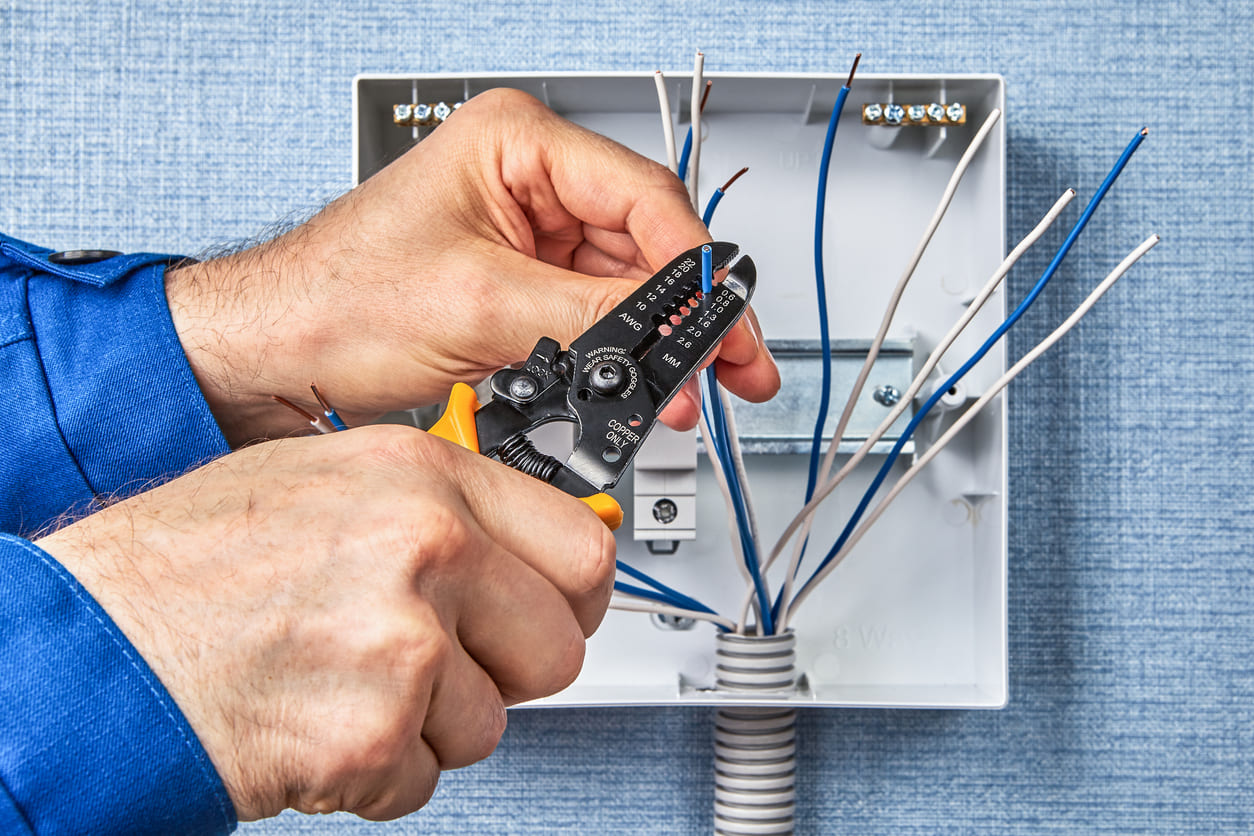 Electrician Cutting Wires