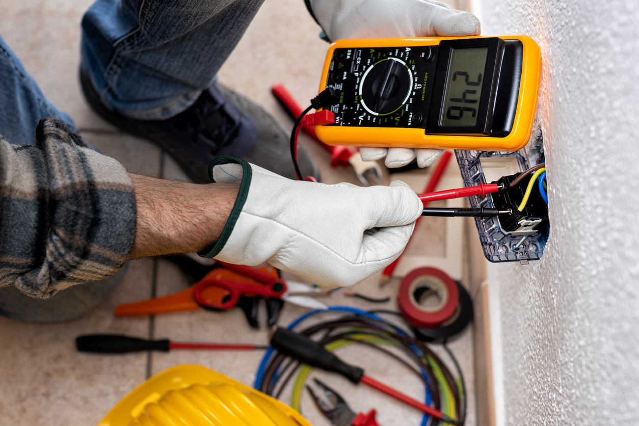 Electrician Working on Outlet