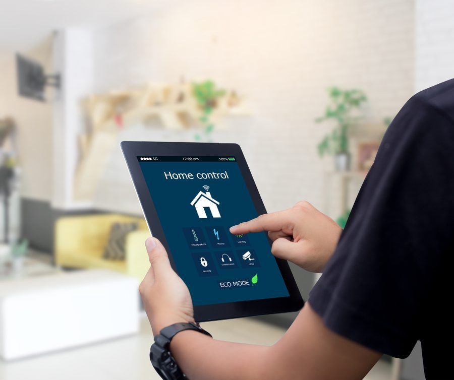 Homeowner using smart home automation to control his home